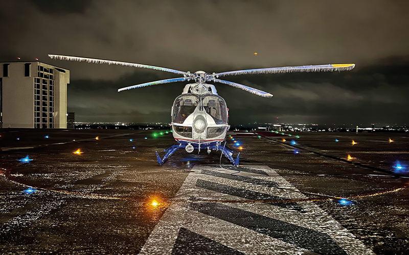 Parked helicopter at night