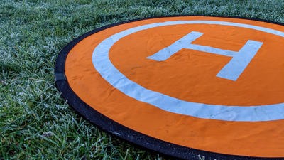drone helipad landing in grass