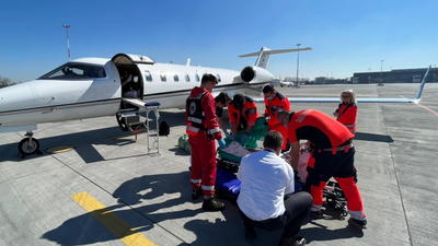 Ukraine refugees loaded for transportation to hospital