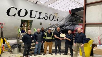 Image of Coulson Aviation team being awarded approval for pilot training