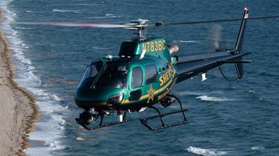 County Sheriff's helicopter flying over waters in Florida