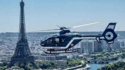 Image of Police helicopter flying over Paris