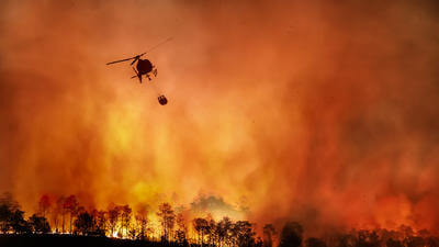 Image of aerial firefighting of wildfire in US