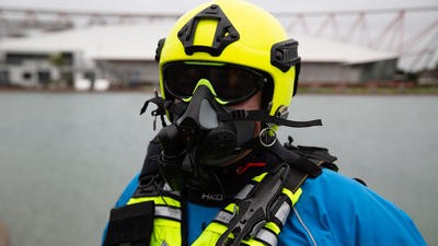 Rescue worker wearing swimming mask