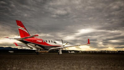 Conair plane parked on runway