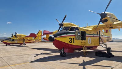 Yellow Italian planes parked
