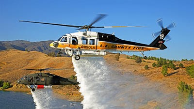 LA County fire helicopter dropping fire retardant