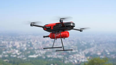 Aerial firefighting drone in sky