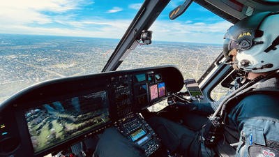 Helicopter pilot in cockpit