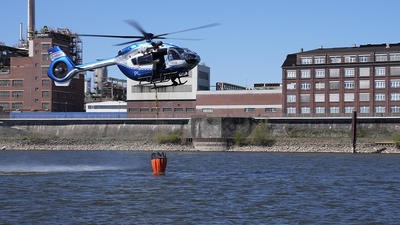 Helicopter picking up water