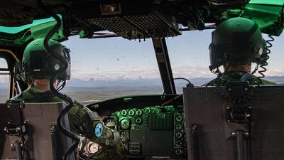 helicopter pilots in cockpit