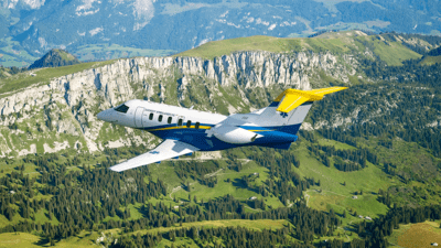Plane flying above mountains