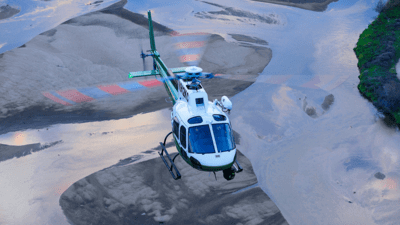 Helicopter flying over river