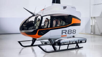 R88 Robinson helicopter parked
