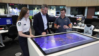 Rotorcraft team looking at screen on desk