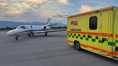 Plane next to ambulance