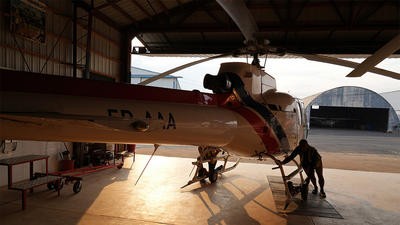Helicopter parked in garage