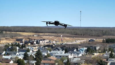 Drone flying above town