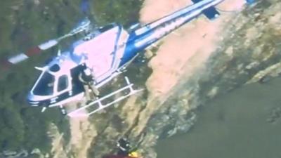 Man rescued after 70-ft cliff fall