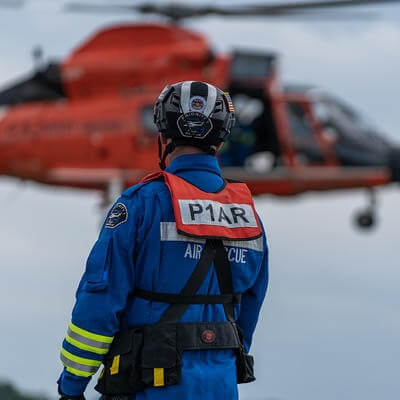 P1AR rescue worker waiting for helicopter to land