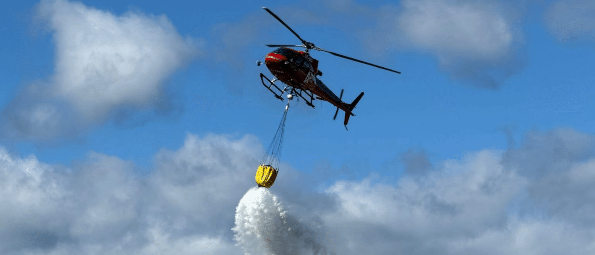 Airbus H125 dropping water with Caurus Sensor attached