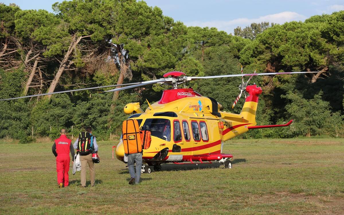 Medics walking towards parked air ambulance