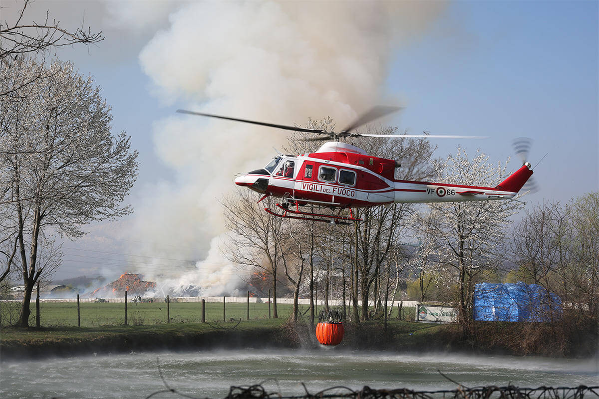 Helicopter flying over river