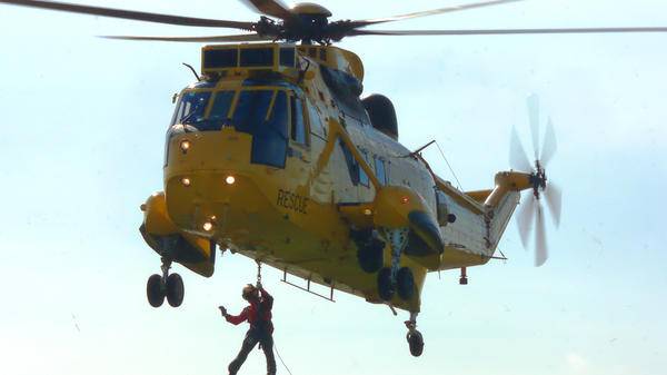 Sea King Rescue helicopter and winchman