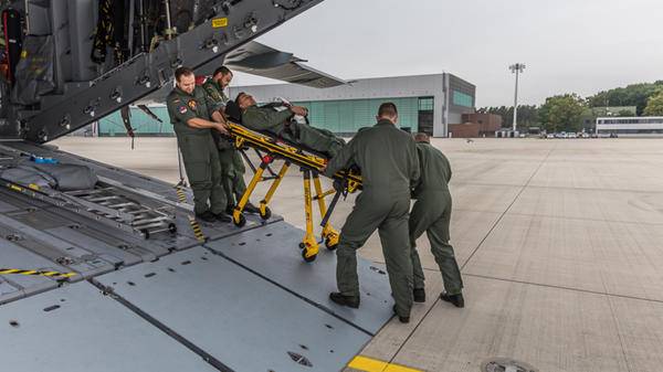 Loading a simulated patient onto the A400M