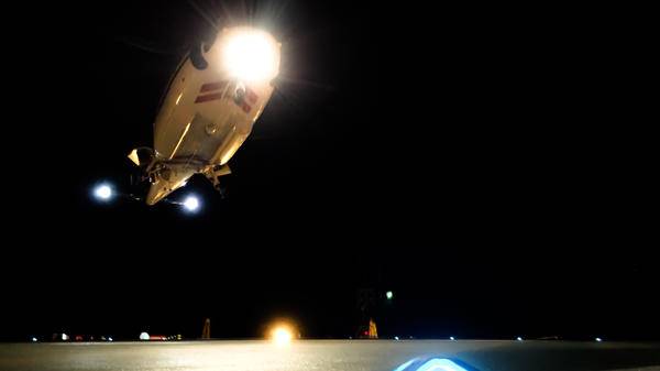 flying helicopter at night
