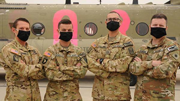 CH-47 Chinook Crew: (from left) CW2 Brady Hlebain, SGT Cameron Powell, SGT George Esquivel, and CW5 Joesph Rosamond