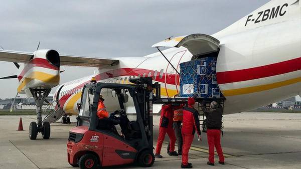 Conair plane being loaded