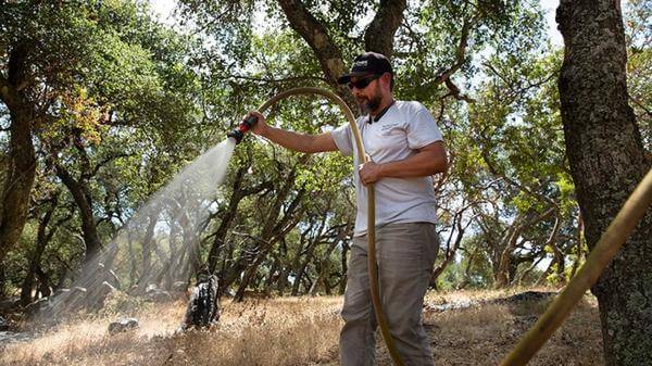 Man using a hose