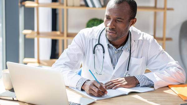 Doctor on laptop