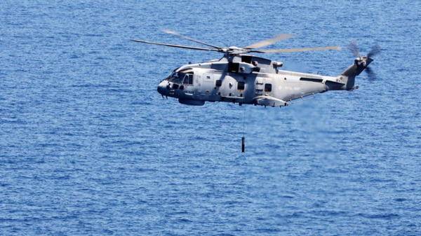 Merlin helicopter conducting anti-submarine operations