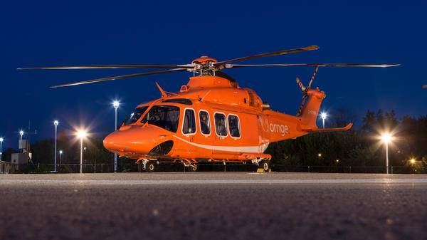 Ornge Leonardo AW139 on helipad at night
