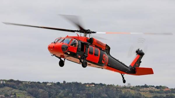 Black Widow Helicopters Trans Aero red and black helicopter