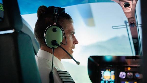 Pilot talking on headset