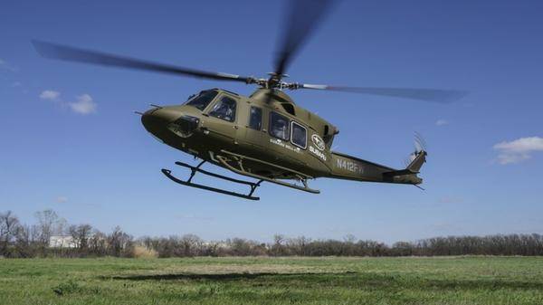 Image of Subaru Bell 412 EXP helicopter landing