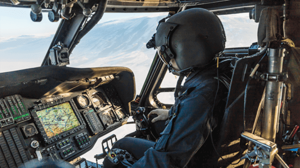 Man flying helicopter