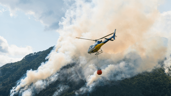 Helicopter flying over smokey hill