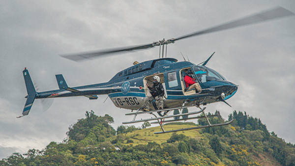 Helicopter flying with crew