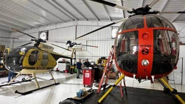 Image of MD Helicopter in manufacturing warehouse