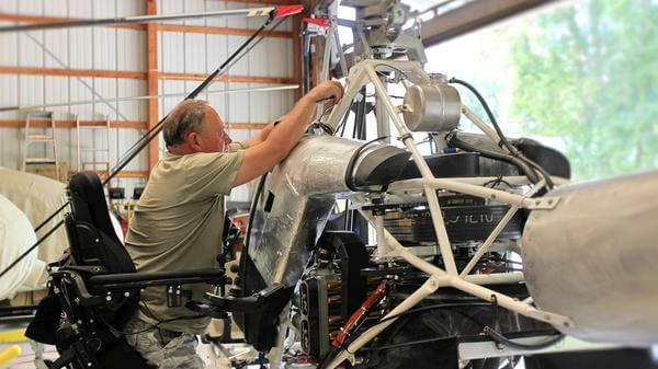 Stewart McQuillan fixing helicopter