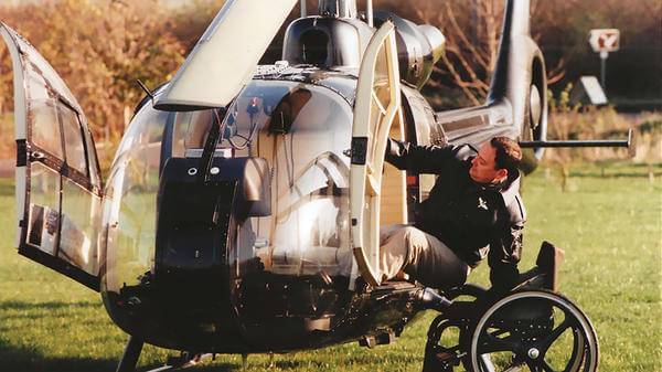 Young Stewart McQuillan getting helicopter