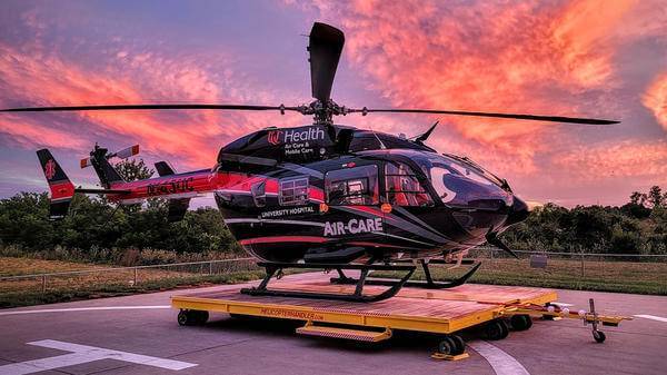 Helicopter parked during sunset 