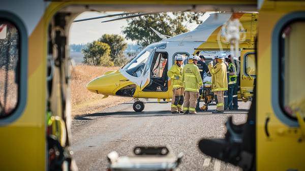 Patient being treated next to air ambulance