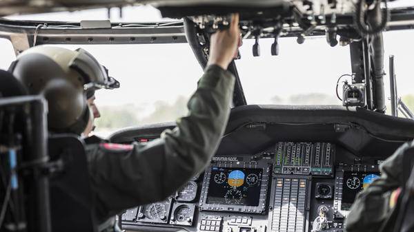 Helicopter pilot in cockpit