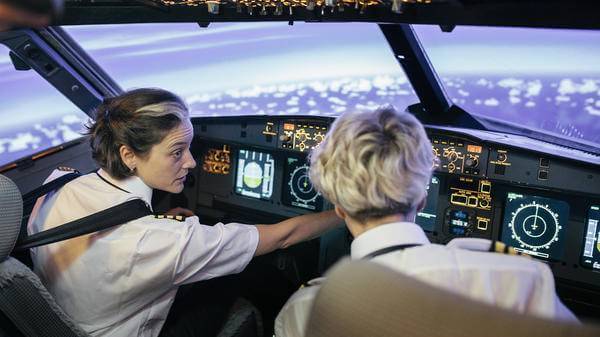 Female helicopter pilot training student