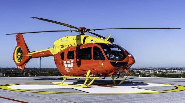 Stationary red helicopter